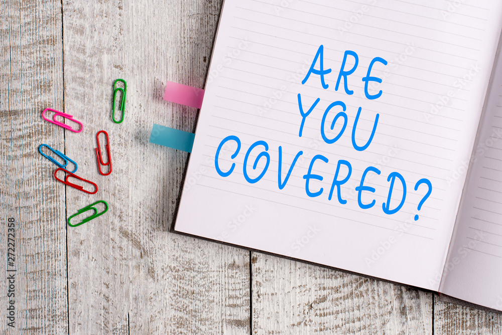 Text sign showing Are You Covered Question. Business photo text asking showing if they had insurance in work or life Thick pages notebook stationary placed above classic look wooden backdrop Text sign showing Are You Covered Question. Business photo text asking showing if they had insurance in work or life Thick pages notebook stationary placed above classic look wooden backdrop