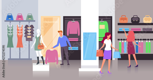 People consumers characters choosing and trying cloth. Shopping concept. Vector flat graphic design cartoon illustration