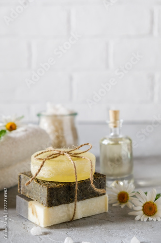 Natural cosmetic oil and natural handmade soap with loofah . Healthy skin care. SPA concept