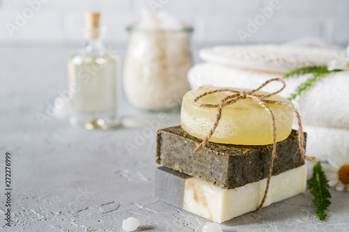 Natural cosmetic oil and natural handmade soap with loofah . Healthy skin care. SPA concept photo