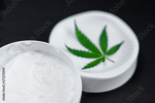 Cannabis ointment natural product. Cosmetic jar cream from natural hemp, lotion with CBD content. Copy space for your design