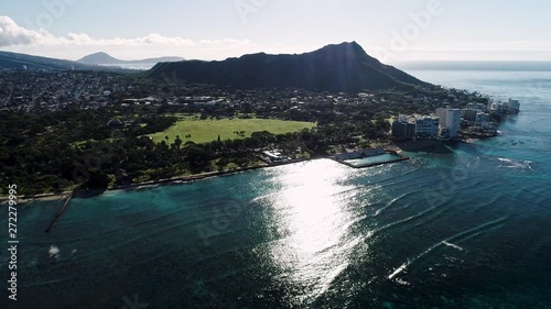 Flying very high with a view of Waikiki beach, Queens beach and Diamond Head, Hawaii. photo