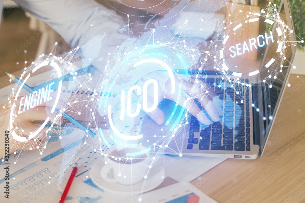Crypto currency theme hologram with businessman working on computer on background. Concept of blockchain. Double exposure. Crypto currency theme hologram with businessman working on computer on background. Concept of blockchain. Double exposure.