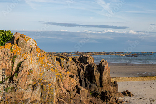 A rocky coastal landscape on the island of Jersey, on a sunny summers day