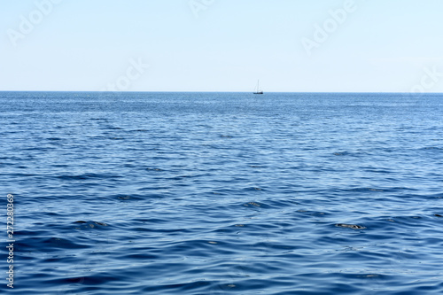  Seascape, boat in the sea opposite the horizon