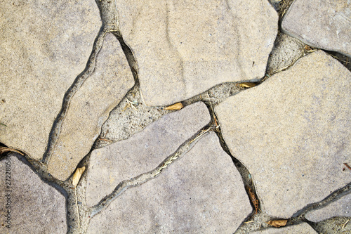 Paving of a path under a light natural stone photo