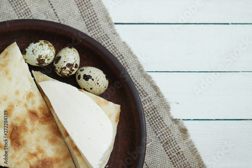 Healthy food background with eggs, cheese, bread on plate