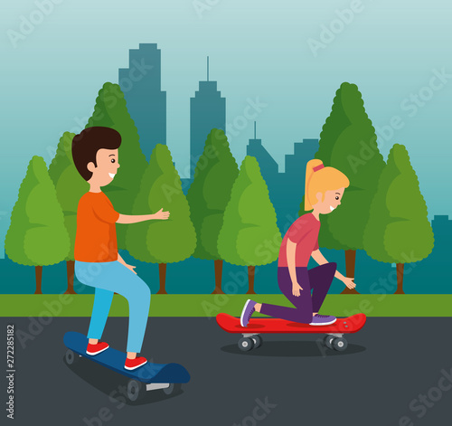 girl and boy kids playing with skateboard