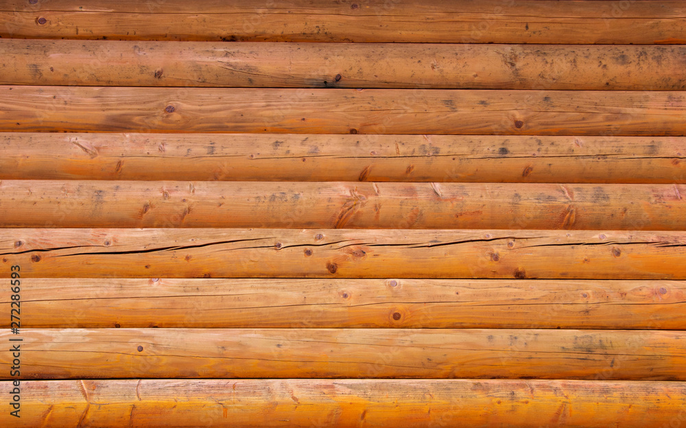 Wooden wall from logs background texture Wooden wall from logs background texture