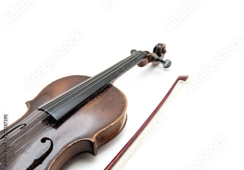 Violin and bow on white background photo