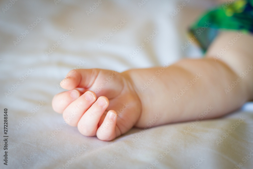 baby relaxed hand close up baby relaxed hand close up