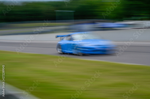 Race car at speed on track