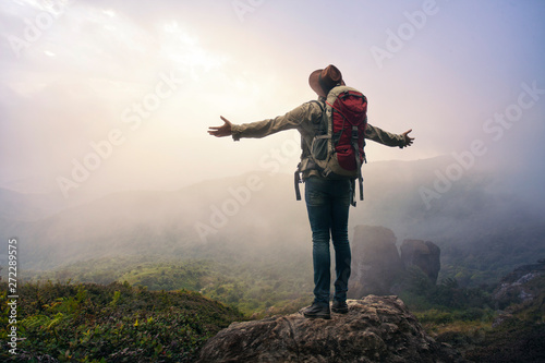 Man hiker standing in the mountains.