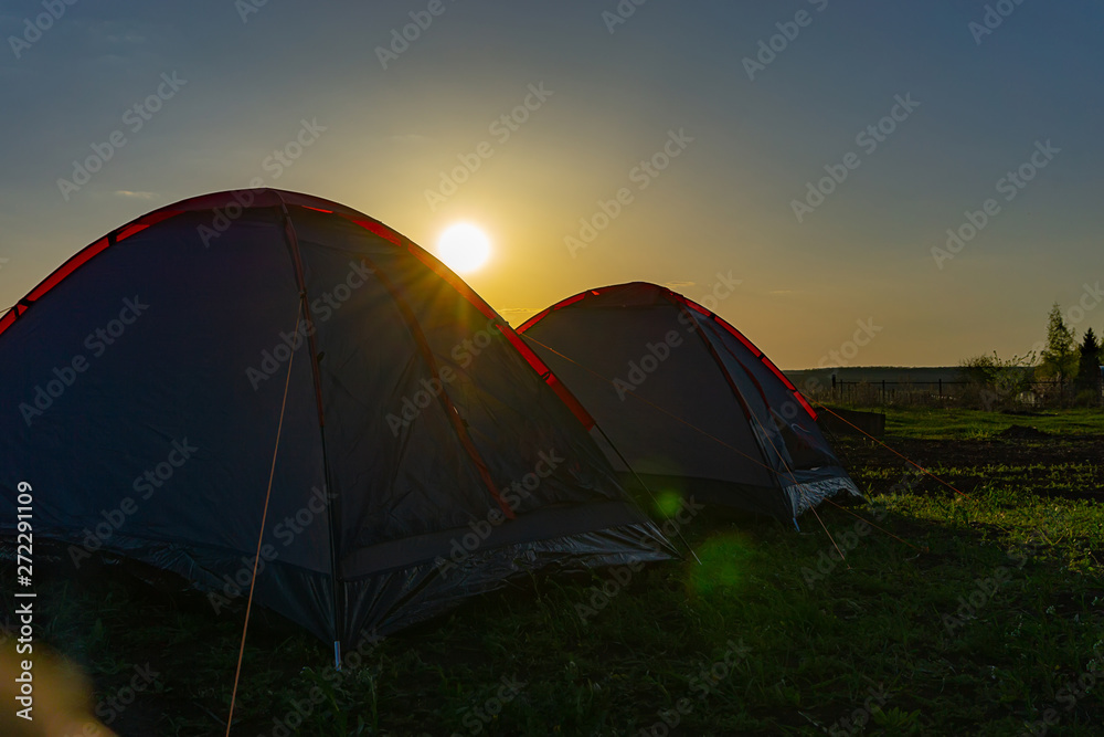 tourist tents in the evening at sunset