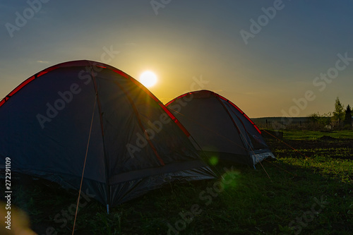 tourist tents in the evening at sunset