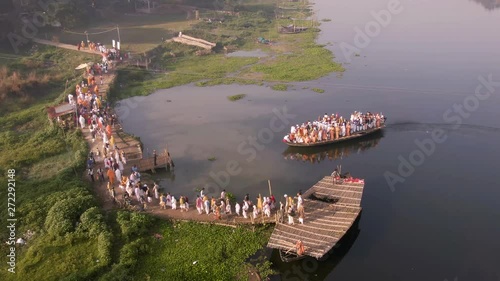 Hare Krishna pilgrims procession in a boat, Mayapur, India, 4k aerial  photo