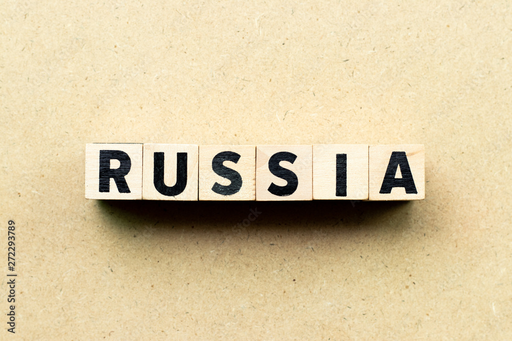 Obraz premium Letter block in word russia on wood background