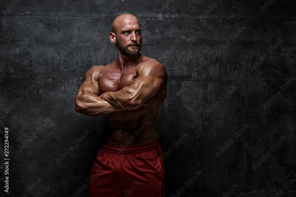 Strong Muscular Men Posing, Flexing Muscles