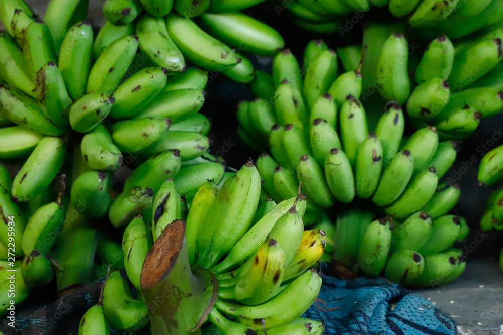 Bananas in a fruit market in a village along the Red River (Yuan River) in Yunnan, China