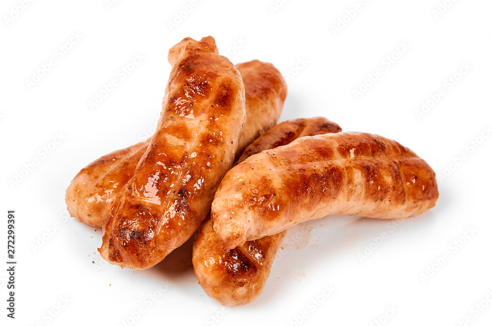 Meat sausages with glitter on a light background. Fried sausage. The concept of traditional cuisine.