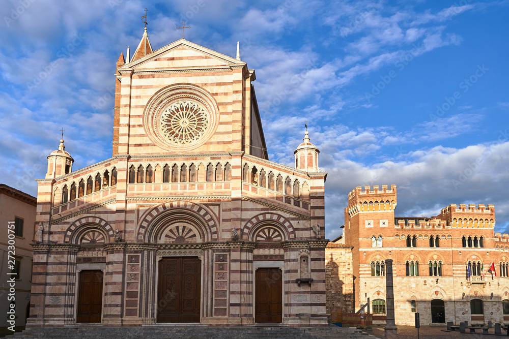 Facade of the historic cathedral and town hall building in the city of Grosseto, Italy.