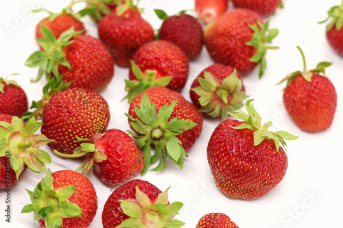 Fototapeta Naklejka Na Ścianę i Meble -   ripe strawberry on a white background close-up