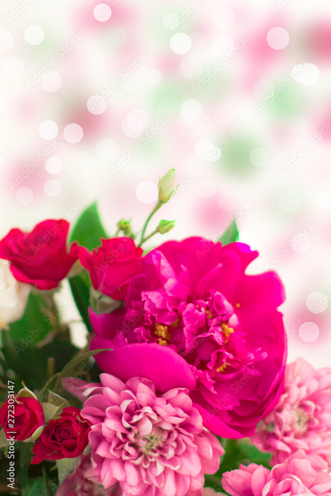 Festive delicate floral background. Fresh bouquet of flowers on a gentle white background Festive delicate floral background. Fresh bouquet of flowers on a gentle white background