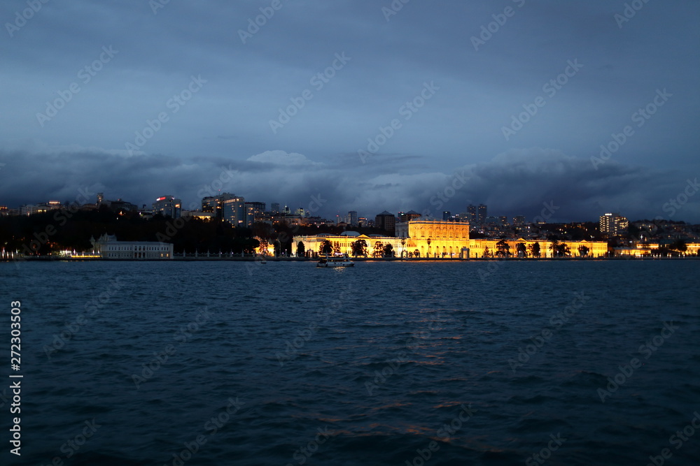 View of Dolmabahce Palace in the night from boat 