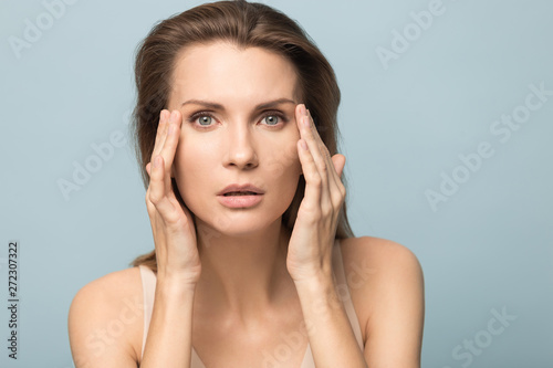 Young attractive woman helping focus eyesight portrait.