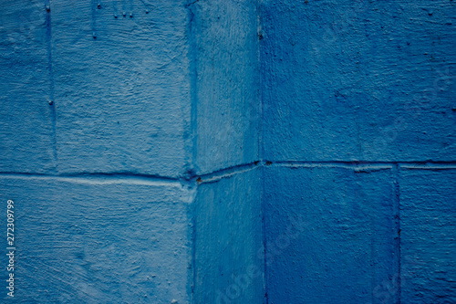 texture of blue paint on wall