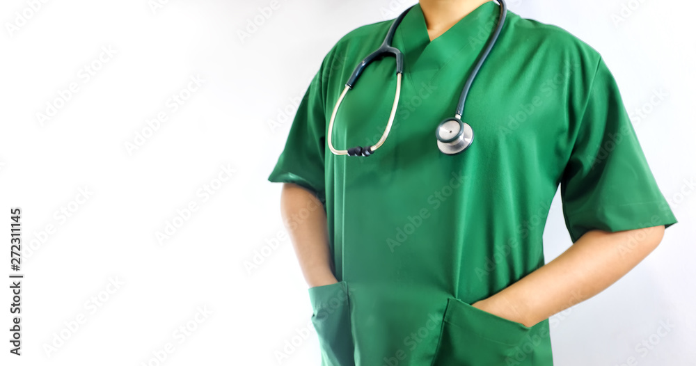 midsection of doctor in green operation room dress midsection of doctor in green operation room dress