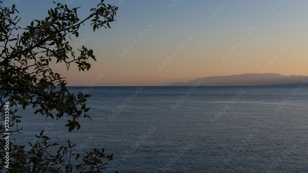 Beautiful sunset on the sea, quiet cozy evening at the seaside Beautiful sunset on the sea, quiet cozy evening at the seaside
