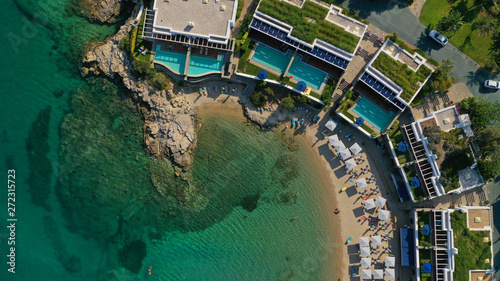 Aerial top view photo of tropical sandy paradise beach with pool facilities in exotic island