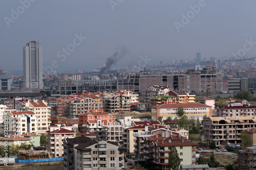 A major construction in Turkey's capital Ankara and rear smoke rising from a fire