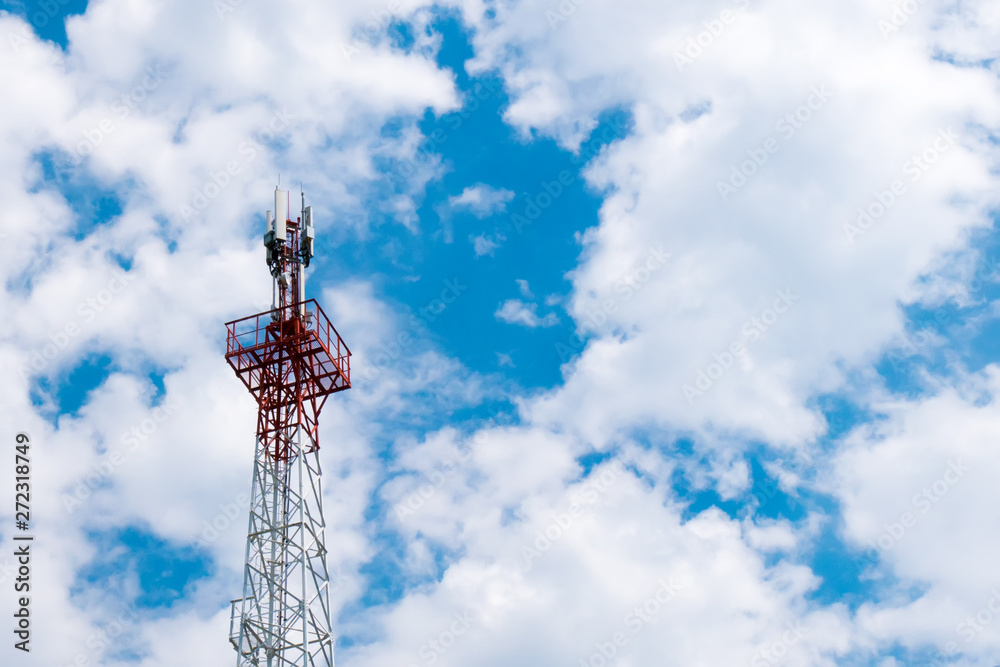 Tower with radar equipment, GSM communications antennas and transmitters against the beautiful blue sky with clouds. Tower with radar equipment, GSM communications antennas and transmitters against the beautiful blue sky with clouds.