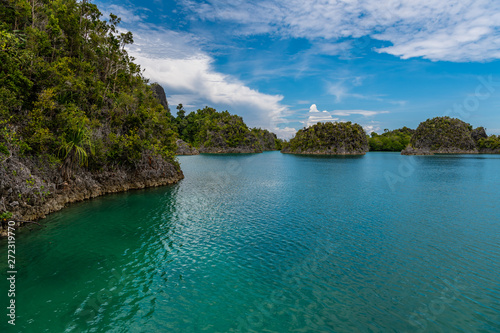 Waigeo, Kri, Mushroom Island, group of small islands in shallow blue lagoon water, Raja Ampat, West Papua, Indonesia © Subphoto