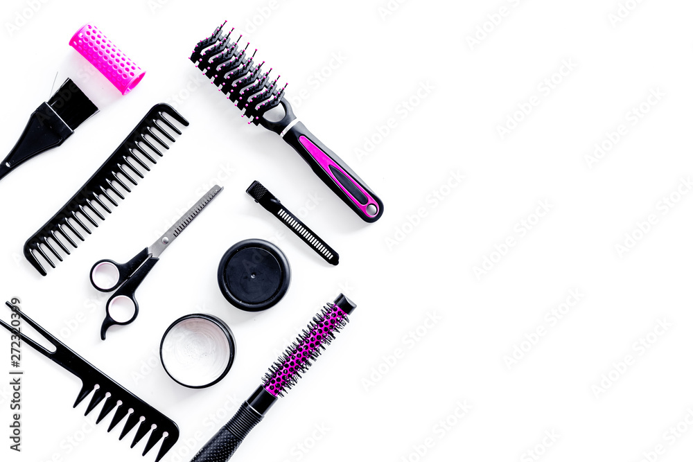 Set of professional hairdresser tools with combs and sciccors on white background top view mock up Set of professional hairdresser tools with combs and sciccors on white background top view mock up