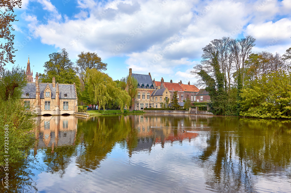 the lake of love in minnewater park, bruges