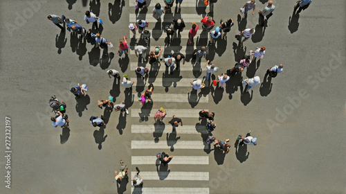 Bild auf Leinwand Aerial. People crowd on pedestrian crosswalk. Top view.