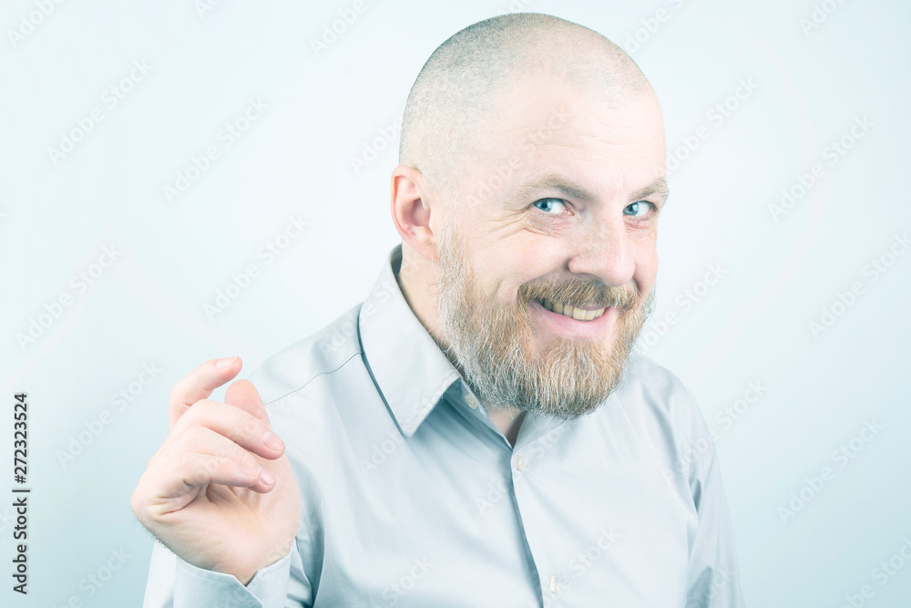 portrait of a bearded happy man. joy in every day of life.
