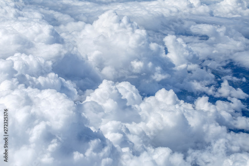 view of the of the beautiful cumulus clouds from the window airplane