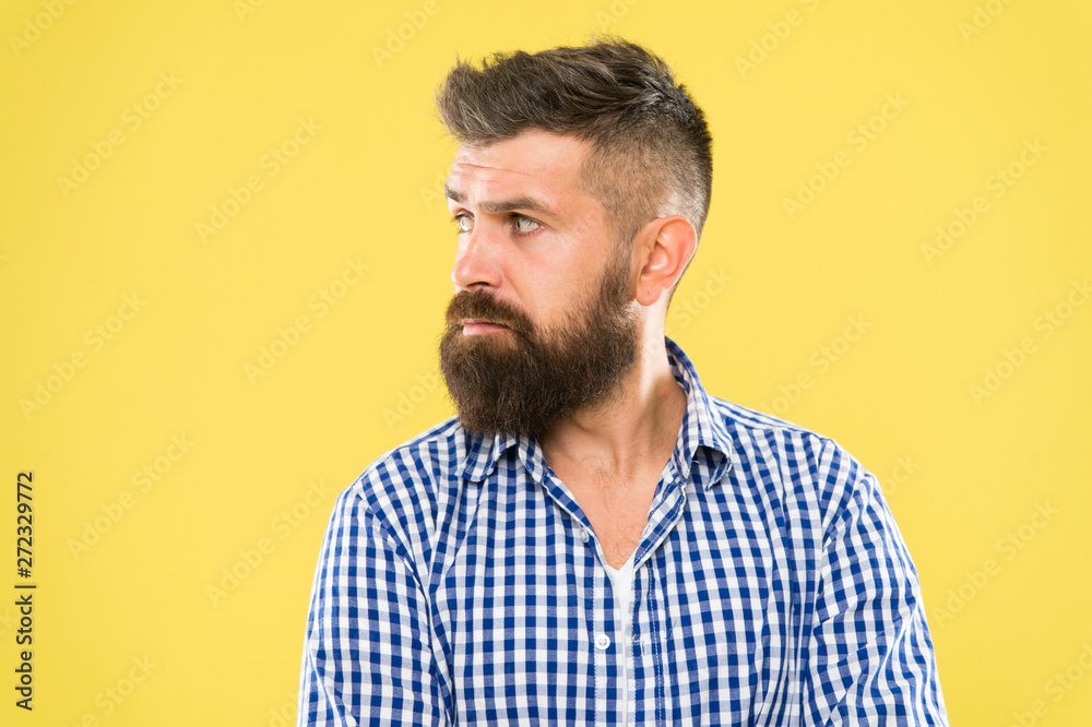 Have some doubts. Hipster bearded face not sure in something. Thoughtful bearded man on yellow background close up. Thoughtful expression. Need to think. Thoughtful man hesitating making decision Have some doubts. Hipster bearded face not sure in something. Thoughtful bearded man on yellow background close up. Thoughtful expression. Need to think. Thoughtful man hesitating making decision