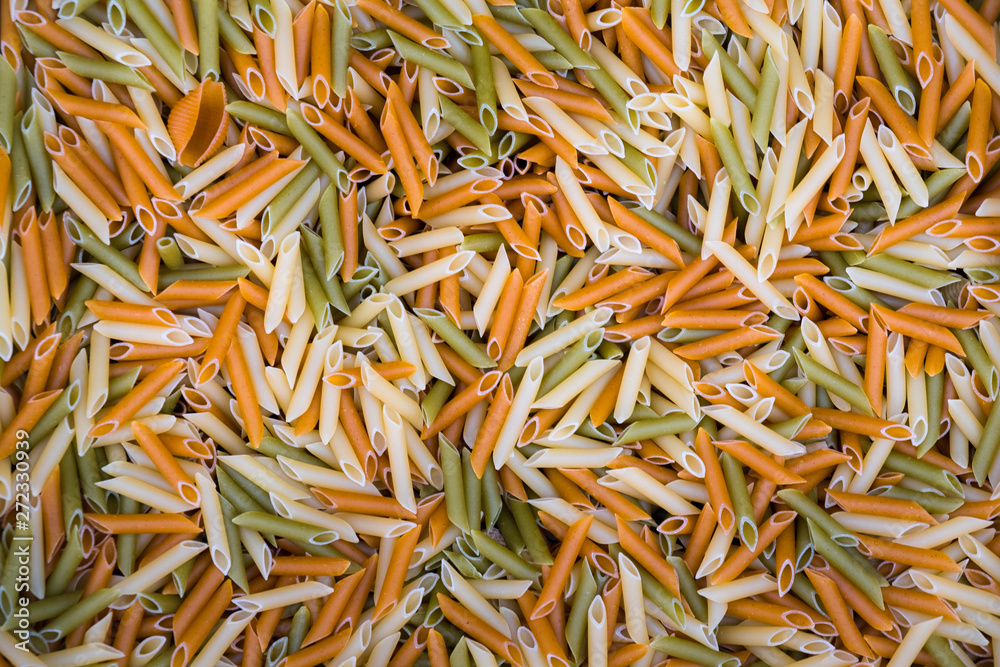 pasta feathers of different colors on weight in large quantities in bulk