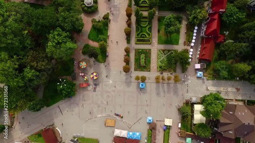 Old city aerial footage of a small town sunset green grass colorful tree building landscape scenic countryside village urban aerial street travel view europe plant houses outdoor slow motion
