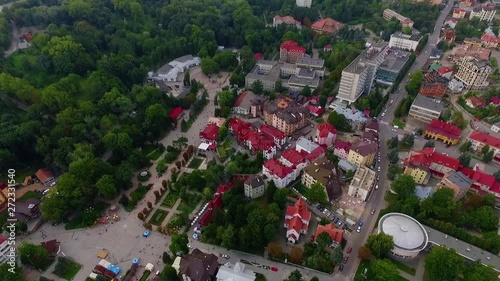 Slow moion old city aerial footage of a small town sunset green grass colorful tree building landscape scenic countryside village urban aerial street travel view europe plant houses outdoor slow