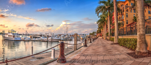 Sunset over the boats in Esplanade Harbor Marina in Marco Island photo