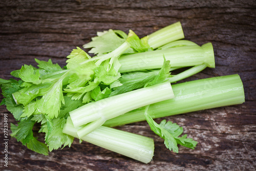 Fresh vegetable of Celery sticks and leaf / Bunch of celery stalk on rustic wood