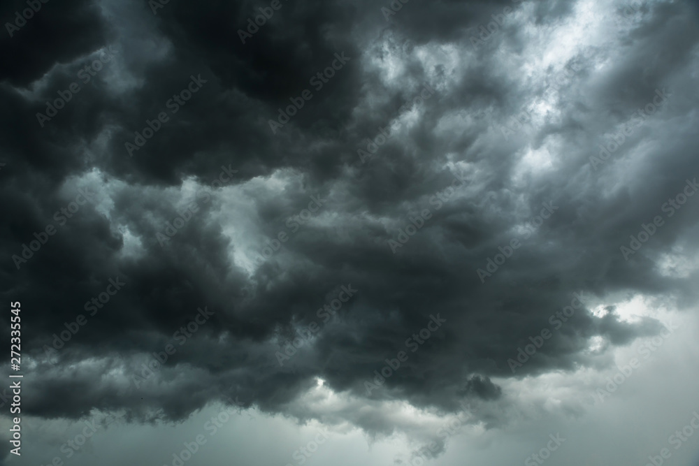 Fototapeta premium Black cloud and thunderstorm before rainy, Dramatic black clouds and dark sky