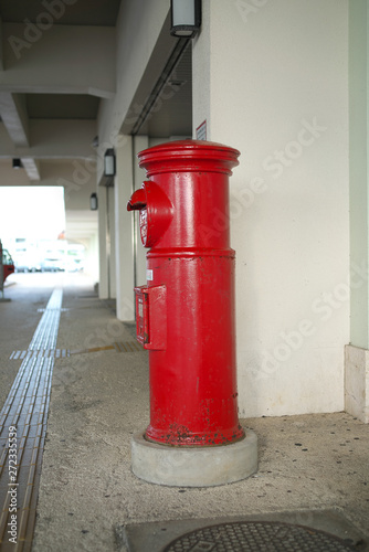 Wallpaper Mural Okinawa,Japan-June 1, 2019: A landmark of Ishigaki island: A traditional red postbox at Ishigaki Ferry Terminal in Ishigaki island, Okinawa   Torontodigital.ca