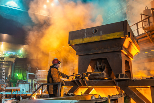 operator working in metallurgical engineering at manufactory of steel plant  